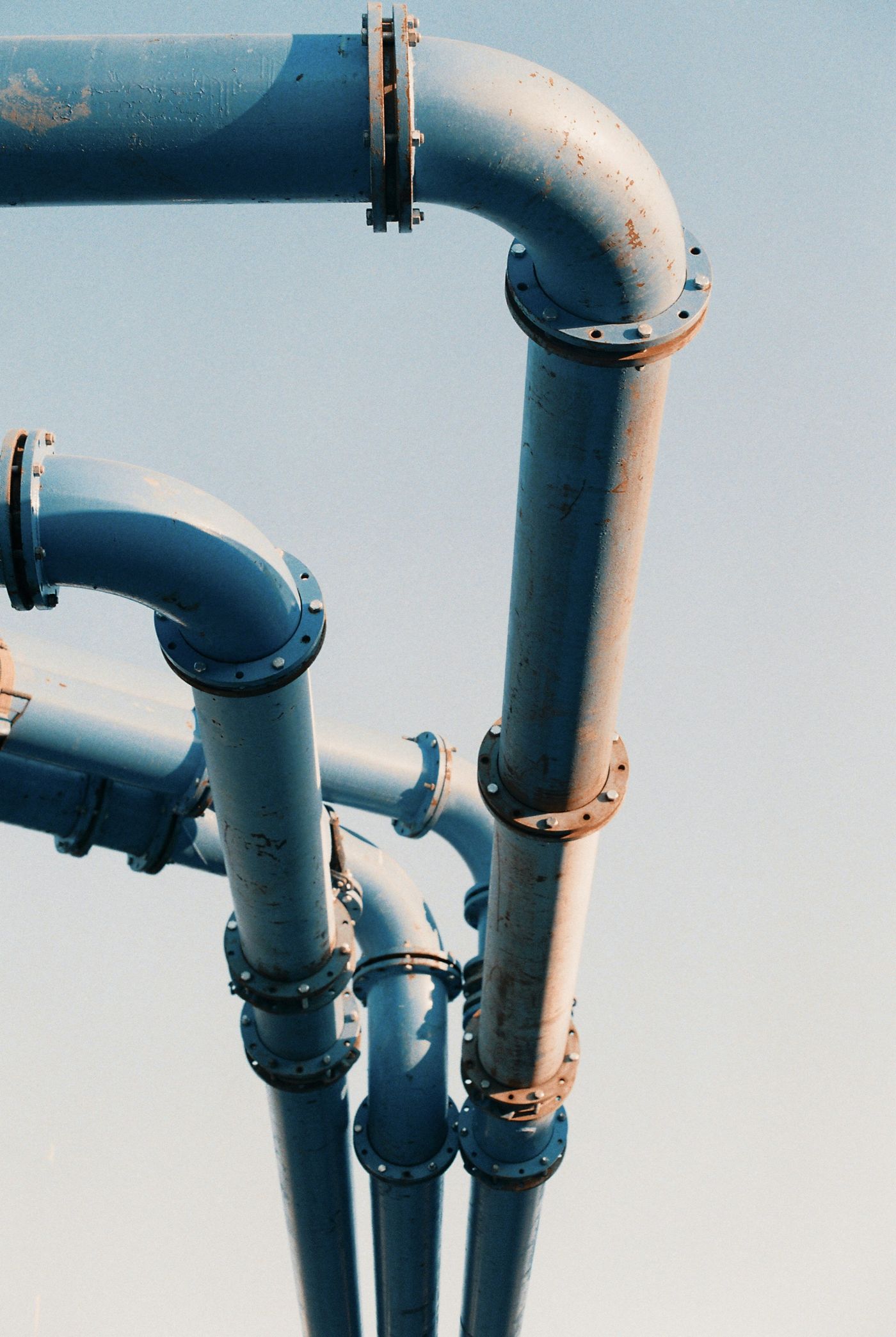Blue water pipework with flanged bends